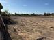 Picture of a vacant lot ready for construction. This expansive space offers a great opportunity for building your dream home at 4455 W Ford Ave, Las Vegas, NV 89139