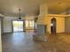Living room featuring an entertainment center, tile floors, recessed lighting and sliding glass doors at 4455 W Ford Ave, Las Vegas, NV 89139