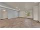Bright living room features neutral walls, tile flooring, and recessed lighting at 4455 W Ford Ave, Las Vegas, NV 89139