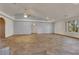 This is a large living room featuring tile flooring, neutral walls, and recessed lighting at 4455 W Ford Ave, Las Vegas, NV 89139