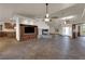 Bright living room boasts a fireplace, an entertainment center, and access to the kitchen at 4455 W Ford Ave, Las Vegas, NV 89139