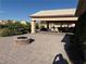 Paver patio with outdoor seating and fire pit at 4455 W Ford Ave, Las Vegas, NV 89139