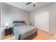 This bedroom offers a ceiling fan and closet at 4524 Stardusk Falls Ave, North Las Vegas, NV 89084