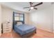 This bedroom features a ceiling fan and closet at 4524 Stardusk Falls Ave, North Las Vegas, NV 89084
