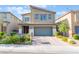 Charming two-story home with a front yard and garage at 4524 Stardusk Falls Ave, North Las Vegas, NV 89084