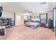 Large main bedroom with a ceiling fan, carpet flooring, and ensuite bathroom at 4524 Stardusk Falls Ave, North Las Vegas, NV 89084