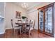 Dining area featuring wood floors, chandelier, and built-in china cabinet at 5000 Red Rock St # 237, Las Vegas, NV 89118