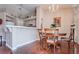 Eat-in kitchen area featuring breakfast bar, dining table, and chandelier at 5000 Red Rock St # 237, Las Vegas, NV 89118