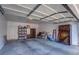 A large garage provides ample space for storage and parking with open white ceiling at 5000 Red Rock St # 237, Las Vegas, NV 89118