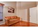 Cozy living room with hardwood floors, tan walls, and comfortable furniture at 5000 Red Rock St # 237, Las Vegas, NV 89118