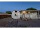 Exterior view of the backyard and shed showing ample room for outdoor activities and creative space at 54 E Texas Ave, Henderson, NV 89015