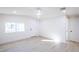 Well-lit bedroom features wood floors, a ceiling fan, and white trim for a clean, modern look at 54 E Texas Ave, Henderson, NV 89015