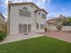 Well maintained backyard featuring a grassy area, patio, and neutral exterior, perfect for outdoor enjoyment at 5452 Big Sky Ln, Las Vegas, NV 89149