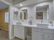 Elegant bathroom with dual sinks, marble countertop, and white cabinetry at 5452 Big Sky Ln, Las Vegas, NV 89149