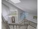 Bright foyer area featuring hardwood floors, high ceilings, and large windows for natural light at 5452 Big Sky Ln, Las Vegas, NV 89149