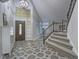 Spacious entry featuring tile, staircase and natural light at 5452 Big Sky Ln, Las Vegas, NV 89149