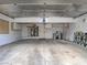 Spacious two car garage with storage cabinets, insulated ceiling, and utility installations at 5452 Big Sky Ln, Las Vegas, NV 89149