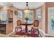 Cozy breakfast nook with a round table and views of the outdoors at 5785 Farmhouse Ct, Las Vegas, NV 89141