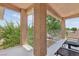 Outdoor balcony offering views of surrounding greenery and cozy seating to relax at 639 I Ave, Boulder City, NV 89005