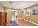 Inviting dining room with wood floors and ample natural light, offering a view to the landscaped backyard at 639 I Ave, Boulder City, NV 89005