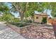 Charming home featuring a brick border planter and walkway at 639 I Ave, Boulder City, NV 89005