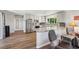View from living room into the kitchen showcasing stainless steel appliances and bar seating at 639 I Ave, Boulder City, NV 89005