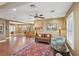 Spacious living room with hardwood floors, a ceiling fan, and neutral paint, perfect for comfortable living at 639 I Ave, Boulder City, NV 89005
