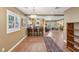 Open-concept living space connects the kitchen, dining, and living areas with hardwood floors at 639 I Ave, Boulder City, NV 89005