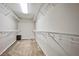 Spacious walk-in closet with carpet and wire shelving, providing ample storage at 6409 Shawnee Springs Ct, Las Vegas, NV 89139