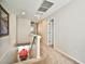 Second floor hallway featuring carpeted floors and white walls at 6409 Shawnee Springs Ct, Las Vegas, NV 89139