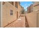 Low maintenance backyard with block wall fencing and gate at 6485 Arrow Cottage Ct, Las Vegas, NV 89130