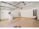 Spacious garage featuring a washer and dryer, ample storage, and an insulated ceiling at 6485 Arrow Cottage Ct, Las Vegas, NV 89130