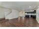 Spacious living room flowing into an open-concept kitchen, perfect for entertaining at 6485 Arrow Cottage Ct, Las Vegas, NV 89130