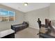 Bedroom featuring a bed, desk, and a window providing natural light at 6626 Seahorse Reef St, Las Vegas, NV 89149