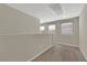 Hallway with carpet, neutral walls, natural light, and simple decor at 6626 Seahorse Reef St, Las Vegas, NV 89149