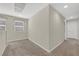 Hallway with carpet, natural light and neutral paint at 6626 Seahorse Reef St, Las Vegas, NV 89149