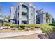 Attractive building with well-maintained landscaping and balconies at 6955 N Durango Dr # 3089, Las Vegas, NV 89149