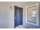 Exterior view of the front door with modern paint and trim at 6955 N Durango Dr # 3089, Las Vegas, NV 89149