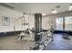 A clean and functional gym area with a variety of weightlifting machines at 6955 N Durango Dr # 3089, Las Vegas, NV 89149