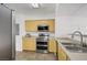 Modern kitchen featuring stainless steel appliances, ample cabinet space, and tile flooring at 6955 N Durango Dr # 3089, Las Vegas, NV 89149