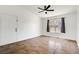 A bright living room with a ceiling fan and natural light at 6955 N Durango Dr # 3089, Las Vegas, NV 89149