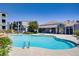 Inviting community pool and clubhouse, perfect for relaxation and socializing at 6955 N Durango Dr # 3089, Las Vegas, NV 89149