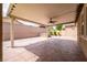 Large covered back patio with ceiling fan, stamped concrete, and a relaxing hot tub at 7525 Campbell Ranch Ave, Las Vegas, NV 89179