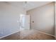 Bedroom features carpet floors, a ceiling fan, and a door to the hallway at 7525 Campbell Ranch Ave, Las Vegas, NV 89179