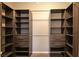 Walk-in closet with custom shelving and drawers, offering ample storage space at 7525 Campbell Ranch Ave, Las Vegas, NV 89179