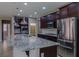 Elegant kitchen with granite countertops, stainless steel appliances, and a functional island at 7525 Campbell Ranch Ave, Las Vegas, NV 89179