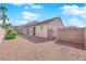 Spacious backyard with gravel and patio area, perfect for outdoor activities and entertaining at 82 Autumn Day St, Henderson, NV 89012