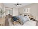Staged bedroom with wood floors and neutral decor at 82 Autumn Day St, Henderson, NV 89012