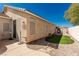 Backyard with rock garden and synthetic grass at 8266 Lincoln Valley St, Las Vegas, NV 89123