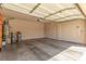 Spacious garage with a high ceiling and water heater at 8266 Lincoln Valley St, Las Vegas, NV 89123